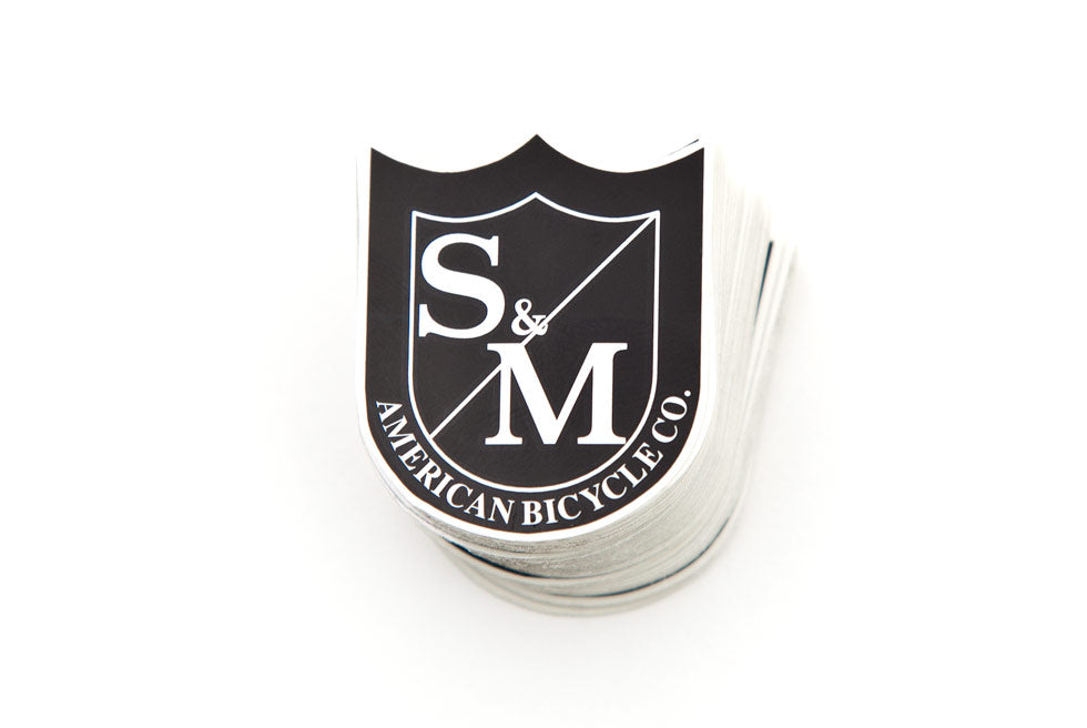 S&M BLACK SHIELD STICKER SMALL SIZE 38mm x 31mm